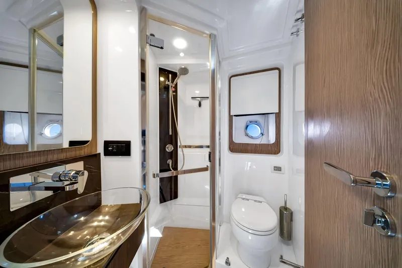 Amf Yacht Photos Pics Luxurious 2021 Azimut S6 yacht bathroom with modern fixtures and elegant design.