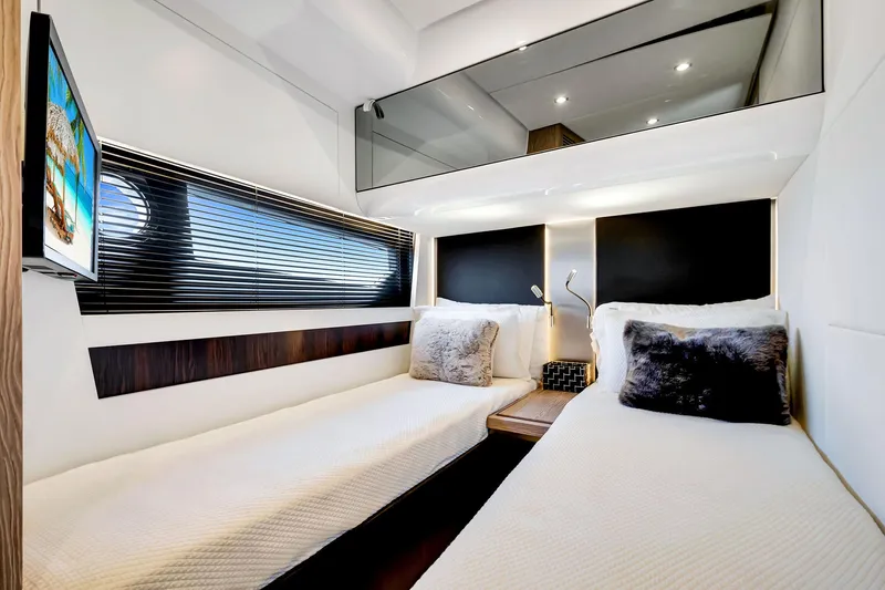 Amf Yacht Photos Pics Luxurious 2021 Azimut S6 yacht cabin with twin beds and modern decor.