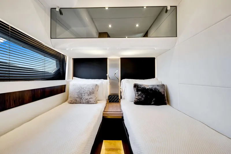 Amf Yacht Photos Pics Luxurious 2021 Azimut S6 yacht cabin with twin beds, modern decor, and ambient lighting.