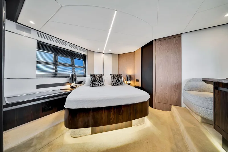 Amf Yacht Photos Pics Luxurious bedroom interior of 2021 Azimut S6 yacht with modern design and elegant furnishings.