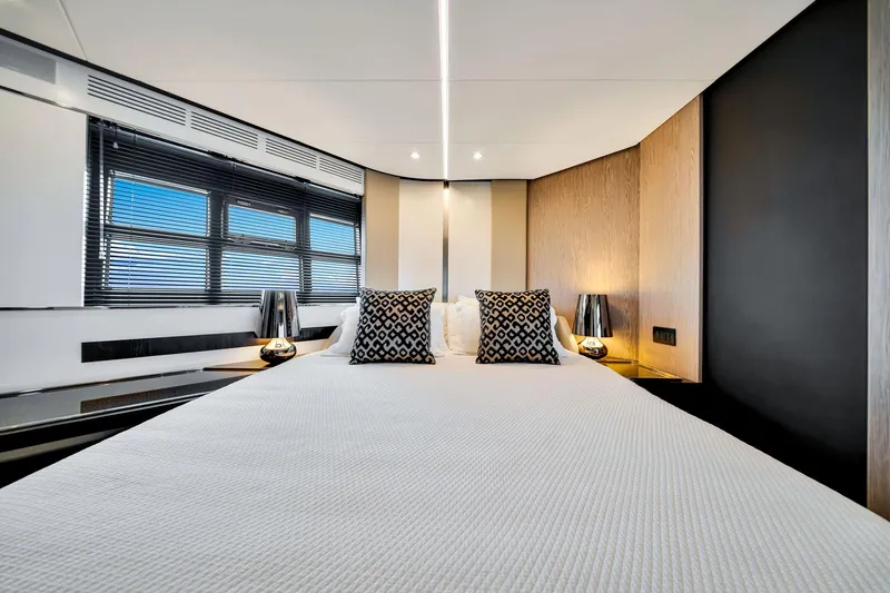 Amf Yacht Photos Pics Luxurious bedroom interior of 2021 Azimut S6 yacht with modern decor and stylish lighting.