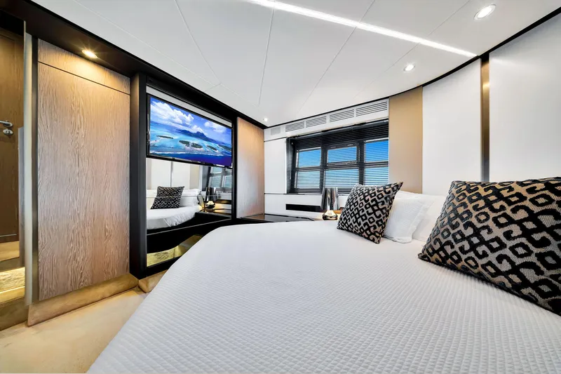 Amf Yacht Photos Pics Luxurious bedroom interior of 2021 Azimut S6 yacht with modern decor and large window.