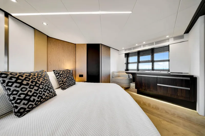 Amf Yacht Photos Pics Luxurious bedroom interior of 2021 Azimut S6 yacht with modern design and elegant furnishings.