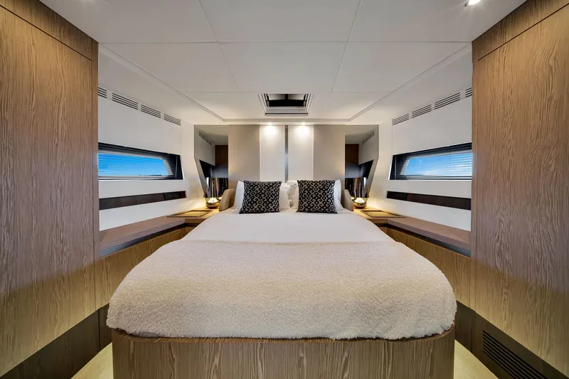 Amf Yacht Photos Pics Luxurious bedroom interior of 2021 Azimut S6 yacht with modern design and cozy bedding.