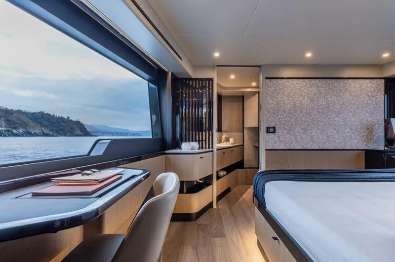 Absolute 56 Fly Yacht Photos Pics Luxurious interior of 2025 Absolute 56 FLY yacht with scenic ocean view.