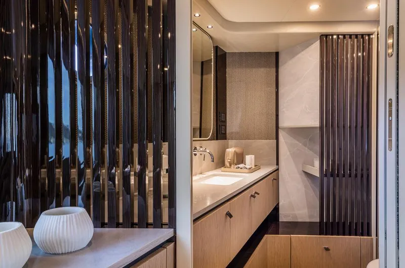 Absolute 56 Fly Yacht Photos Pics Luxurious bathroom interior of 2025 Absolute 56 FLY yacht with modern design elements.