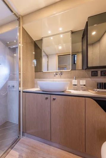 Absolute 56 Fly Yacht Photos Pics Luxurious bathroom interior of 2025 Absolute 56 FLY yacht with modern fixtures and elegant design.