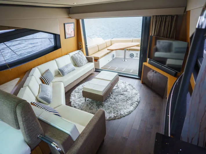 Lakehouse Yacht Photos Pics Luxurious interior of 2016 Sea Ray L590 yacht with elegant seating and modern decor.