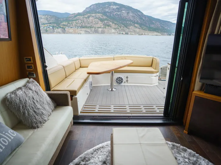 Lakehouse Yacht Photos Pics Luxurious 2016 Sea Ray L590 yacht interior with scenic lake and mountain view.
