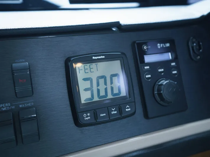 Lakehouse Yacht Photos Pics Control panel of 2016 Sea Ray L590 yacht showing depth at 300 feet.