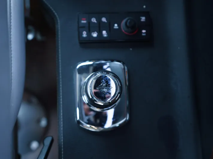 Lakehouse Yacht Photos Pics Control panel and joystick of 2016 Sea Ray L590 yacht.