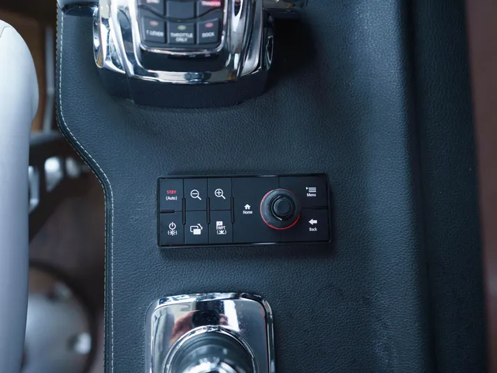 Lakehouse Yacht Photos Pics Control panel of a 2016 Sea Ray L590 yacht, featuring navigation and system controls.