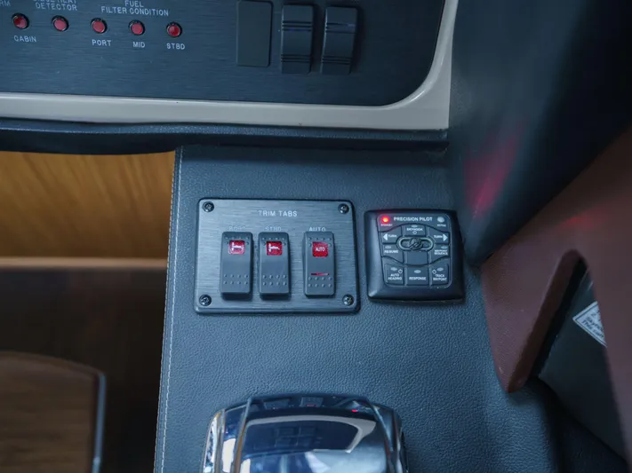 Lakehouse Yacht Photos Pics Control panel of a 2016 Sea Ray L590 yacht with switches and buttons.