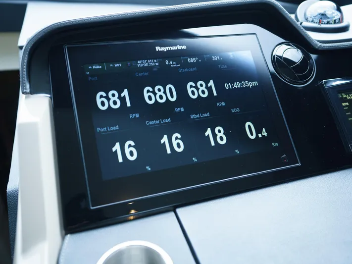 Lakehouse Yacht Photos Pics Digital dashboard display on 2016 Sea Ray L590 yacht, showing RPM and load metrics.
