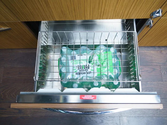 Lakehouse Yacht Photos Pics Drawer with bottled water storage on 2016 Sea Ray L590 yacht.