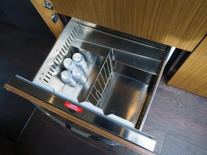 Lakehouse Yacht Photos Pics Stainless steel drawer fridge with cans, inside 2016 Sea Ray L590 yacht.