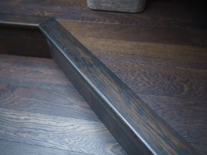 Lakehouse Yacht Photos Pics Dark wooden flooring detail on a 2016 Sea Ray L590 yacht.