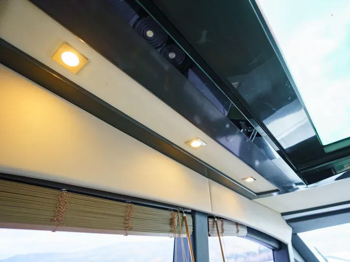 Lakehouse Yacht Photos Pics Interior ceiling lights and window blinds on a 2016 Sea Ray L590 yacht.