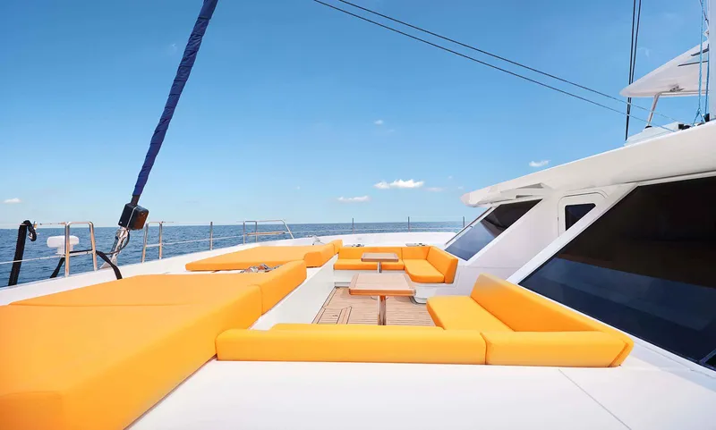 Signature Seaview 59 Yacht Photos Pics Luxurious 2026 Heysea 59 yacht with vibrant orange seating on deck, under clear blue skies.