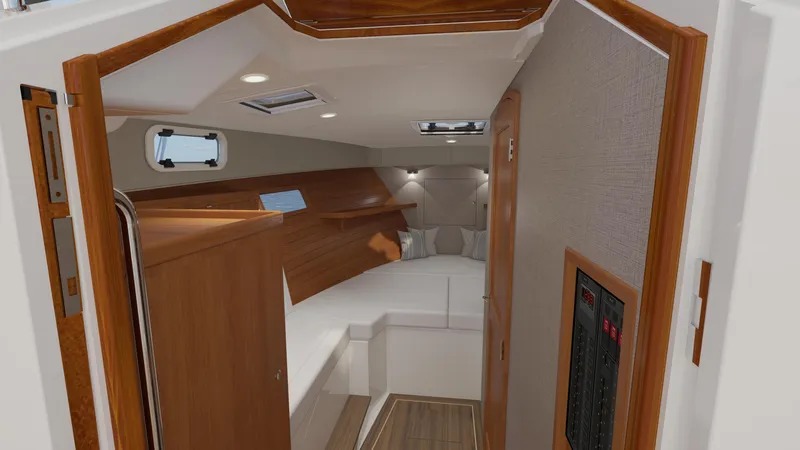  Yacht Photos Pics Luxurious interior of 2026 MJM 38R yacht cabin with wood accents and modern design.
