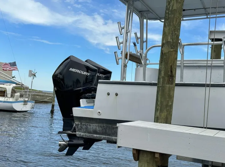  Yacht Photos Pics 1993 Crusader Boats 34 with Mercury outboard motor docked at marina.