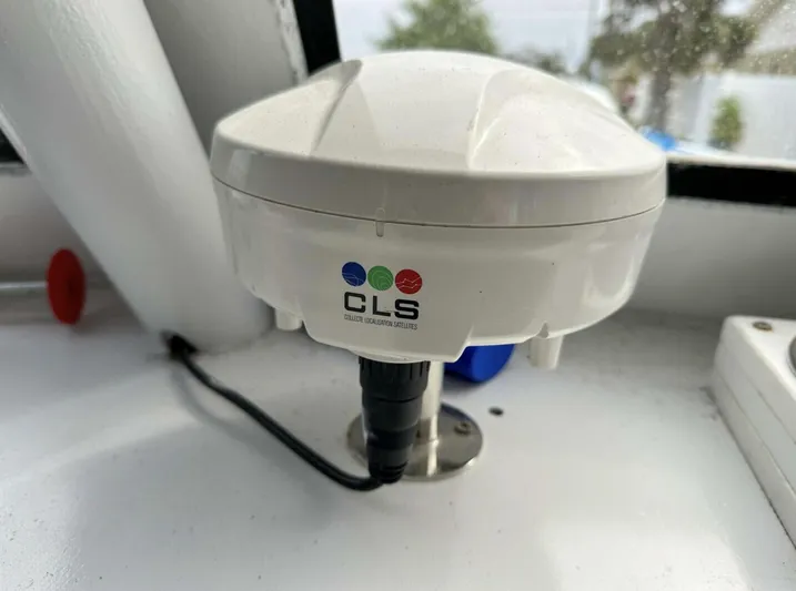  Yacht Photos Pics GPS antenna on a 1993 Crusader Boats 34, featuring a CLS logo.