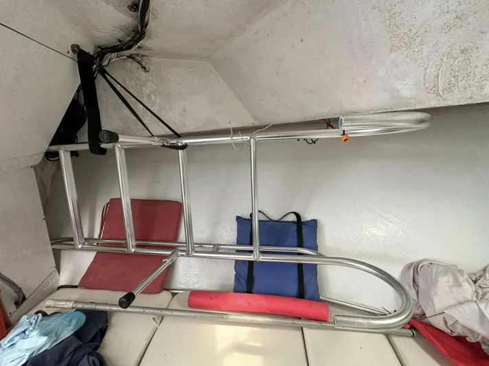  Yacht Photos Pics Interior of a 1993 Crusader Boats 34 with ladder and cushions.