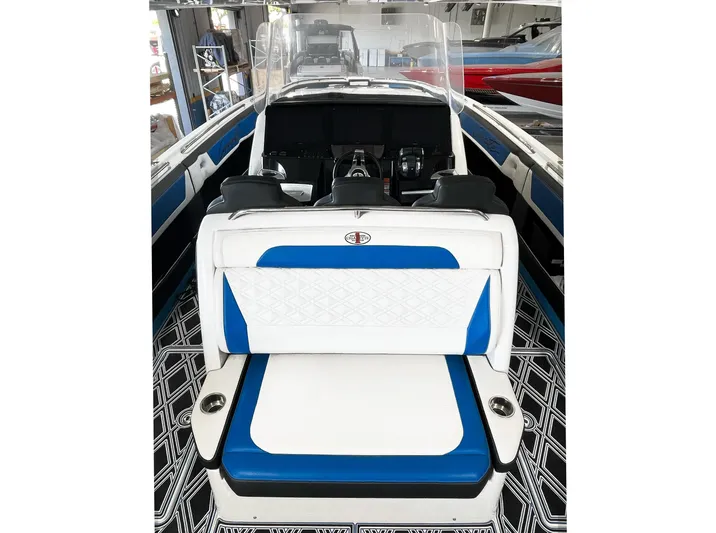  Yacht Photos Pics 2018 Cigarette GTO boat interior with blue and white seating, modern design.