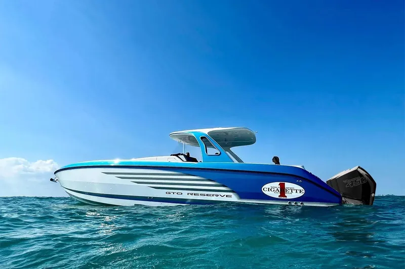  Yacht Photos Pics 2018 Cigarette GTO boat on open water under clear blue sky.