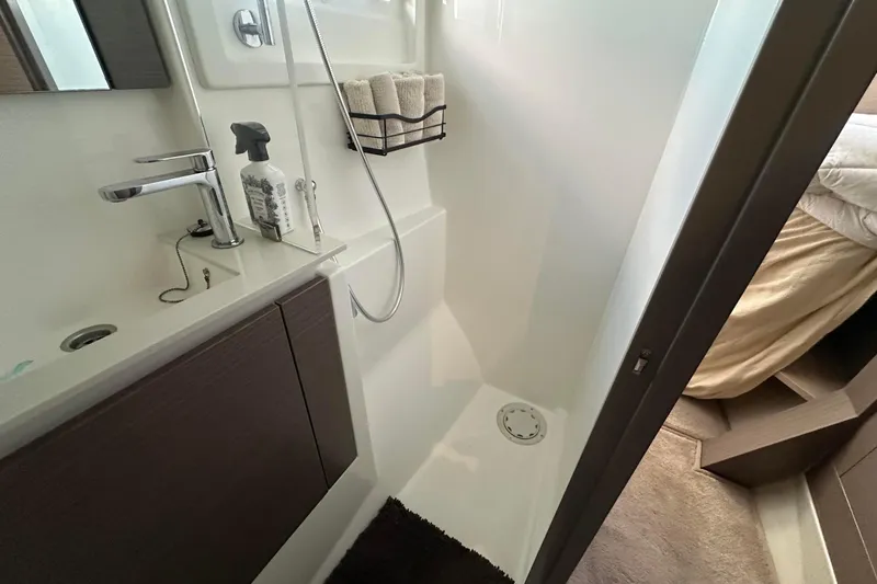 Hamlet Yacht Photos Pics Modern bathroom in 2023 Leopard 46PC yacht, featuring sleek fixtures and compact design.