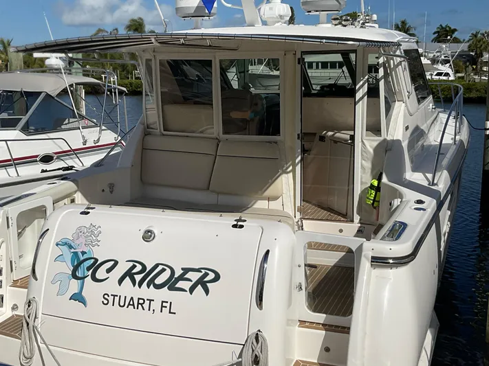 Cc Rider Yacht Photos Pics 2004 Tiara Yachts 4400 Sovran docked, featuring "CC Rider" name, Stuart, FL.