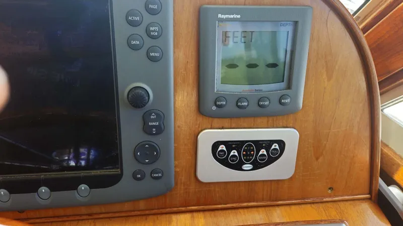 Odyssey III Yacht Photos Pics Control panel of a 2008 Legacy 32 boat with Raymarine display.