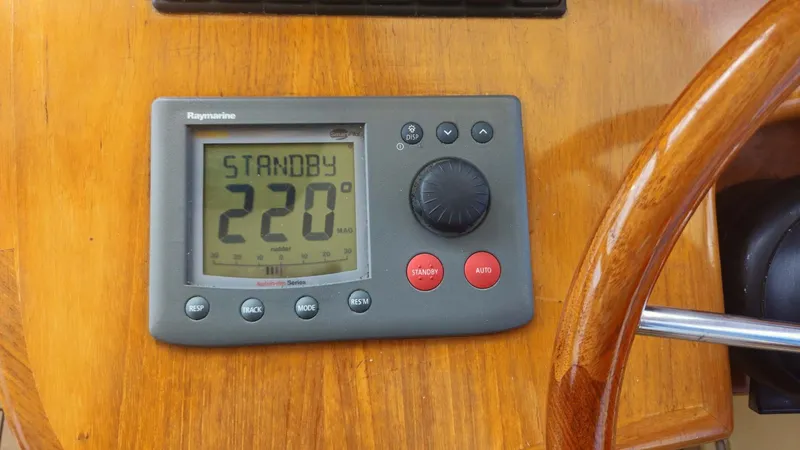 Odyssey III Yacht Photos Pics Raymarine autopilot display on 2008 Legacy 32 boat, showing standby mode at 220 degrees.