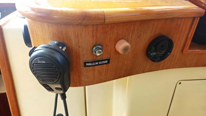 Odyssey III Yacht Photos Pics Control panel of a 2008 Legacy 32 boat with Icom microphone and switches.