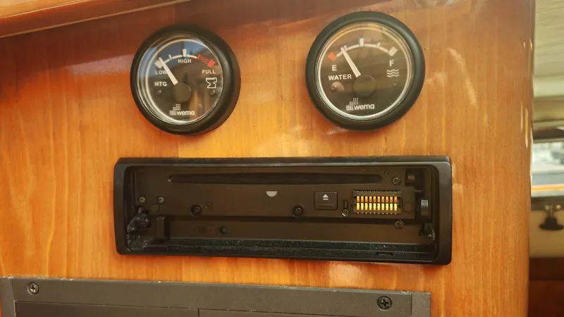 Odyssey III Yacht Photos Pics Control panel with gauges on a 2008 Legacy 32 boat dashboard.