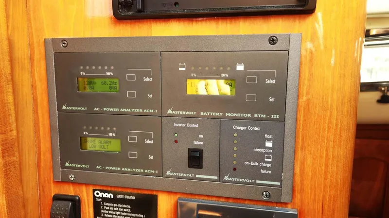 Odyssey III Yacht Photos Pics Control panel with Mastervolt power analyzers and battery monitor on a 2008 Legacy 32.