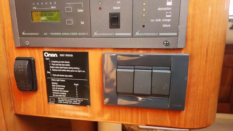 Odyssey III Yacht Photos Pics Control panel with switches and labels on a Legacy 32, 2008 model.