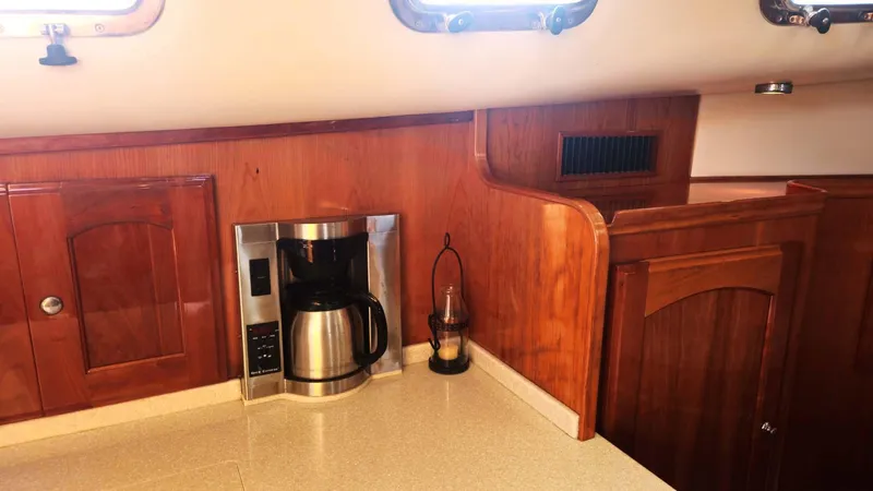 Odyssey III Yacht Photos Pics Wooden boat interior with coffee maker, Legacy 32 model, 2008.