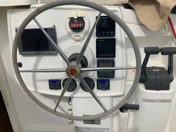  Yacht Photos Pics Steering wheel and controls of a 2011 Fountaine Pajot Lipari 41 catamaran.