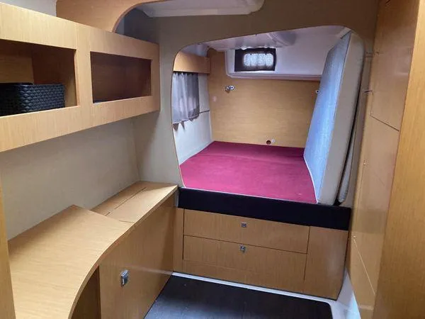  Yacht Photos Pics Interior cabin of 2011 Fountaine Pajot Lipari 41 catamaran with wooden furnishings.