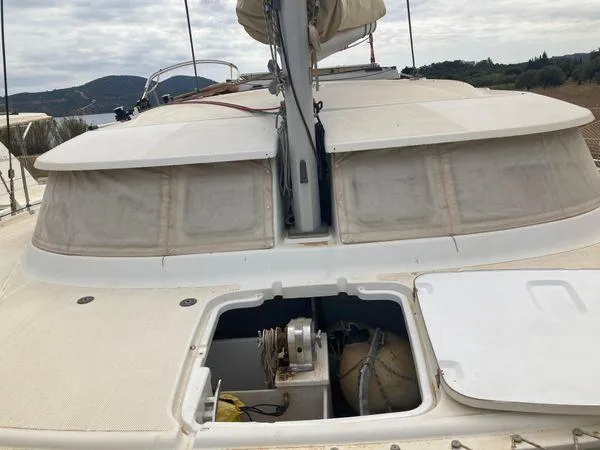  Yacht Photos Pics Fountaine Pajot Lipari 41 catamaran deck, 2011 model, with open storage compartment.