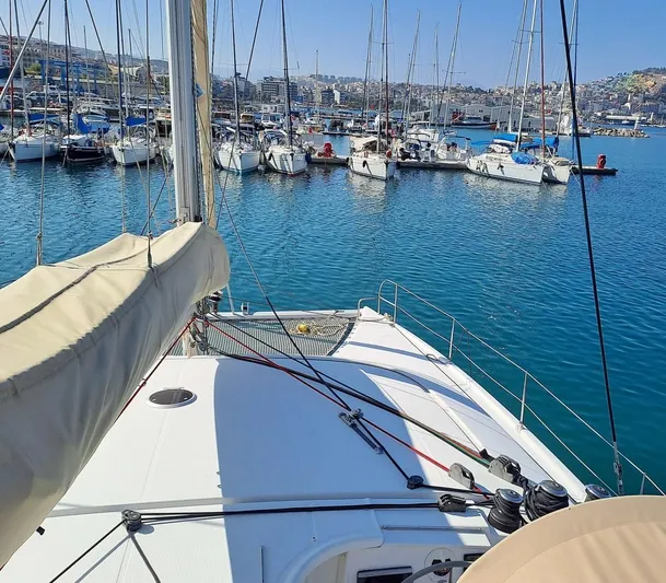  Yacht Photos Pics Sailing catamaran Fountaine Pajot Lipari 41, 2011, docked in a marina with other boats.