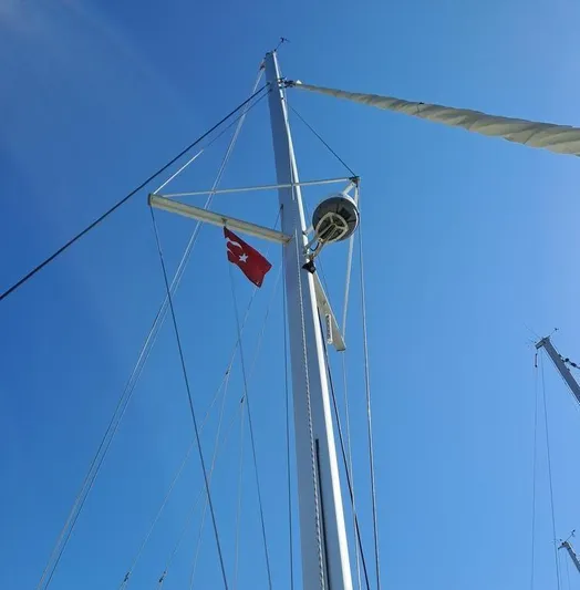  Yacht Photos Pics Sailboat mast of 2011 Fountaine Pajot Lipari 41 against clear blue sky.