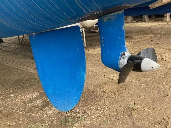  Yacht Photos Pics Fountaine Pajot Lipari 41 catamaran propeller and rudder, 2011 model, on dry land.