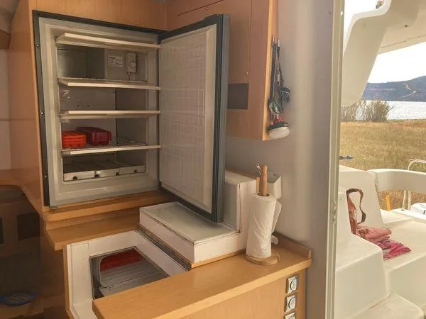  Yacht Photos Pics Open fridge and freezer in 2011 Fountaine Pajot Lipari 41 catamaran kitchen.