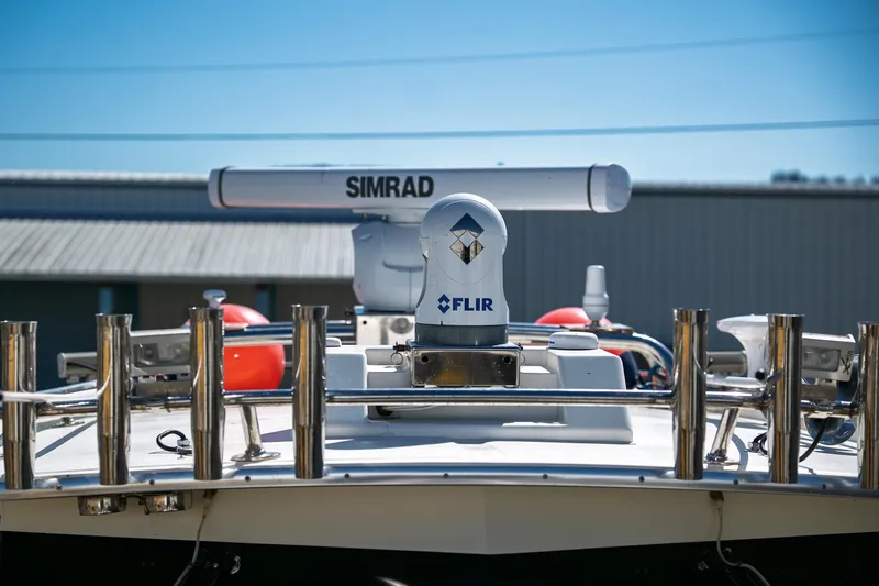 Yacht Photos Pics 1990 Boston Whaler 31 Offshore Custom Conquest with Simrad and FLIR equipment on deck.