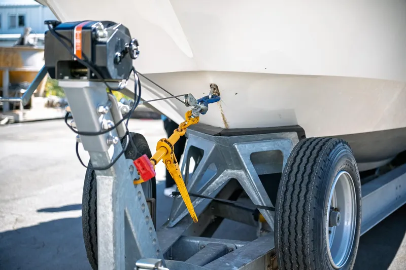 Yacht Photos Pics 1990 Boston Whaler 31 Offshore Custom Conquest on trailer, close-up of hitch and winch.