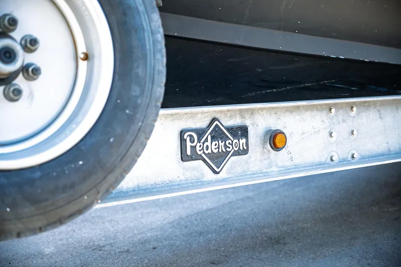  Yacht Photos Pics Trailer with Pederson logo, part of a 1990 Boston Whaler 31 Offshore Custom Conquest.