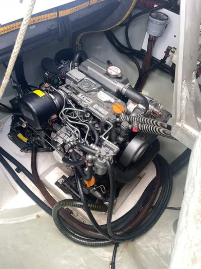Morning Star Yacht Photos Pics Engine compartment of a 2021 Leopard 40 boat, showcasing detailed mechanical components.