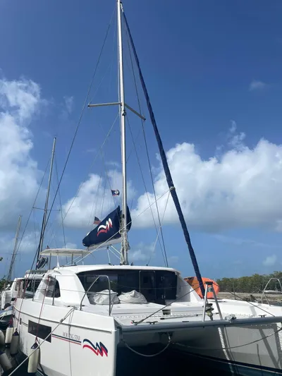Morning Star Yacht Photos Pics 2021 Leopard 40 catamaran docked under a clear blue sky.